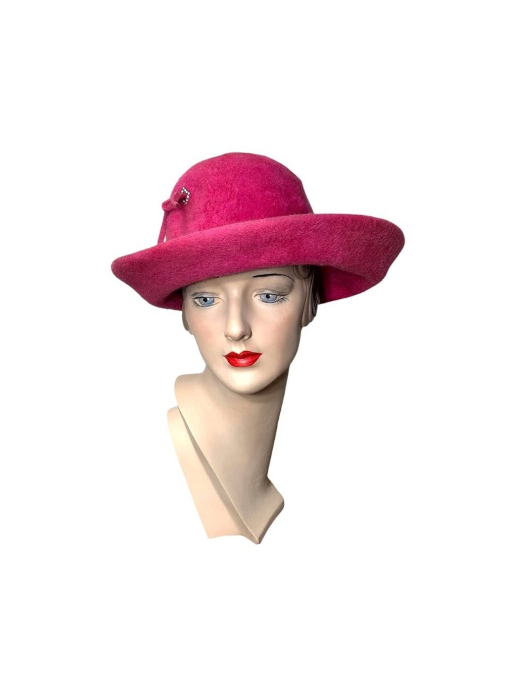1960s pink hat in fur felt with asymmetrical brim and rhinestone accent by Kutz